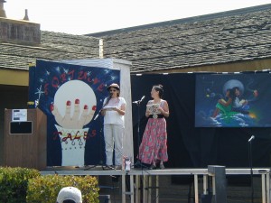 Kathy Richman translates Teresa LeYung Ryan's speech into Spanish