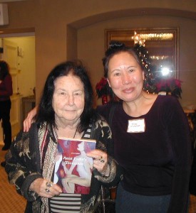 Joyce Robins shows off new book Aunt Lydia's Trousseau, Teresa LeYung Ryan cheers for her
