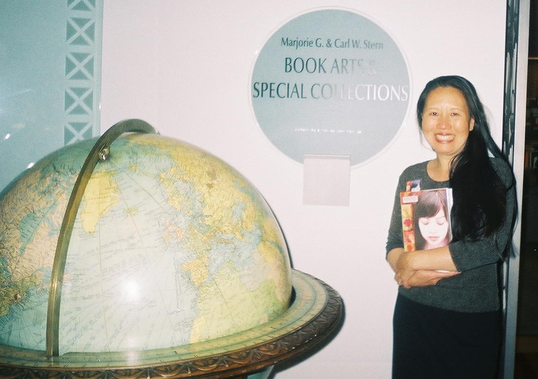 author Teresa LeYung-Ryan overjoyed - her book archived at the San Francisco History Center - photo by Elisa Sasa Southard
